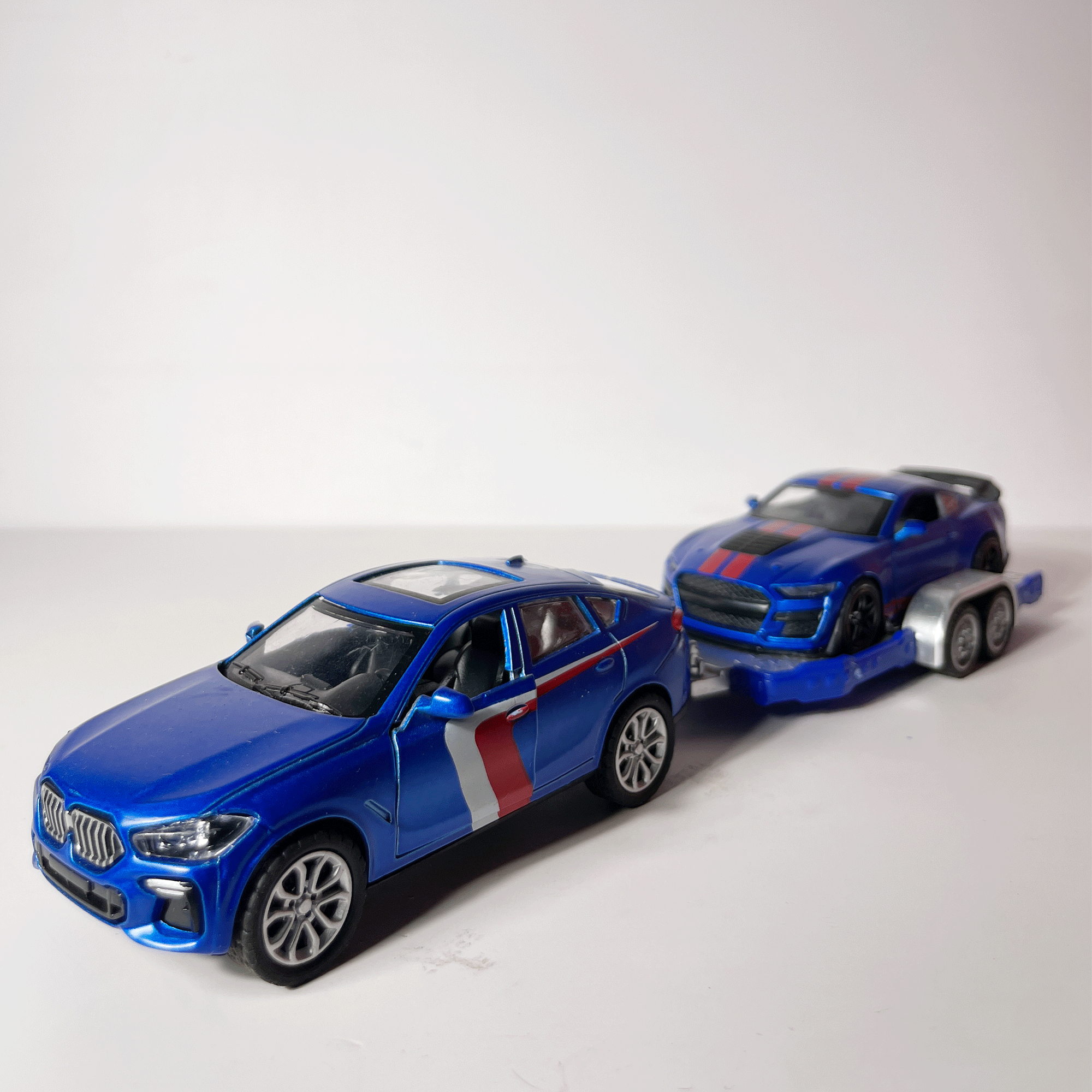 1:43 BMW X6 SUV with Sports Car Trailer Diecast Model Set