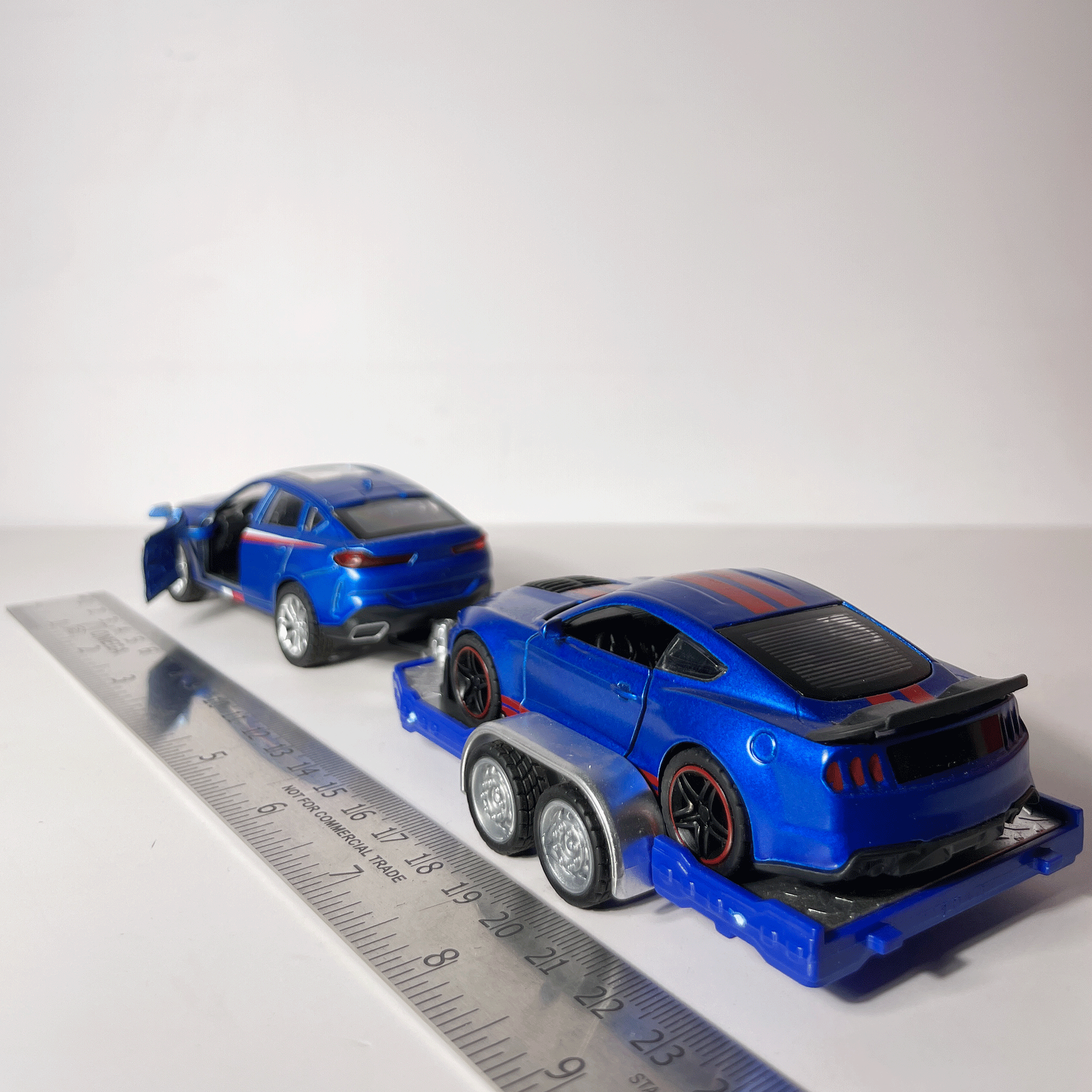 1:43 BMW X6 SUV with Sports Car Trailer Diecast Model Set