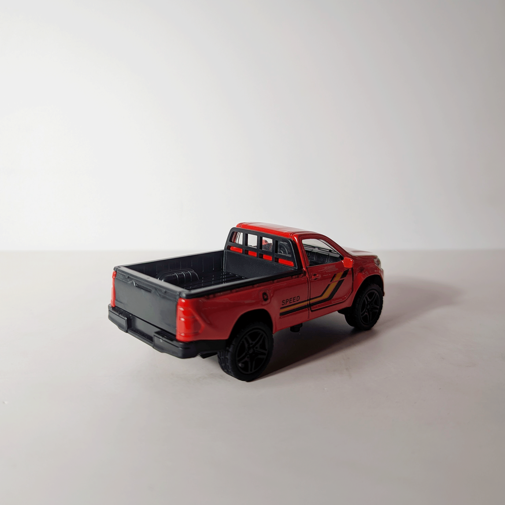 1:36 Hilux Old Model Red
