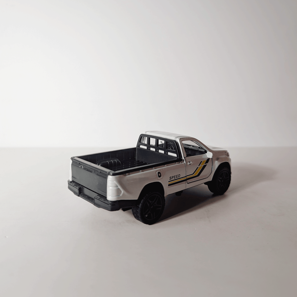 1:36 Hilux Old Model White