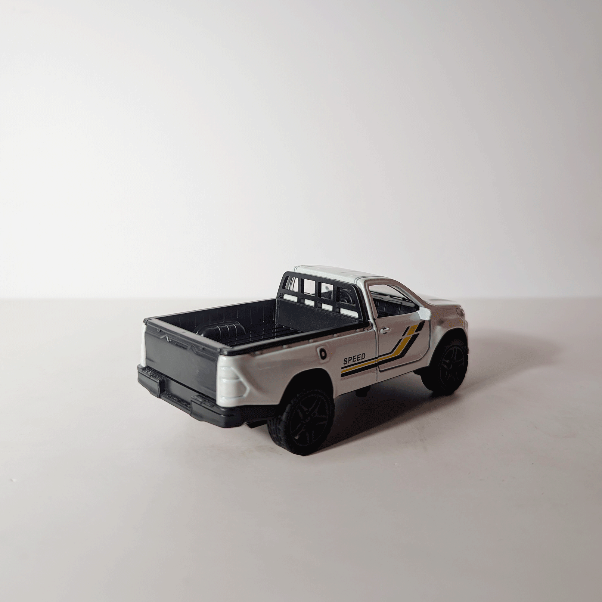 1:36 Hilux Old Model White