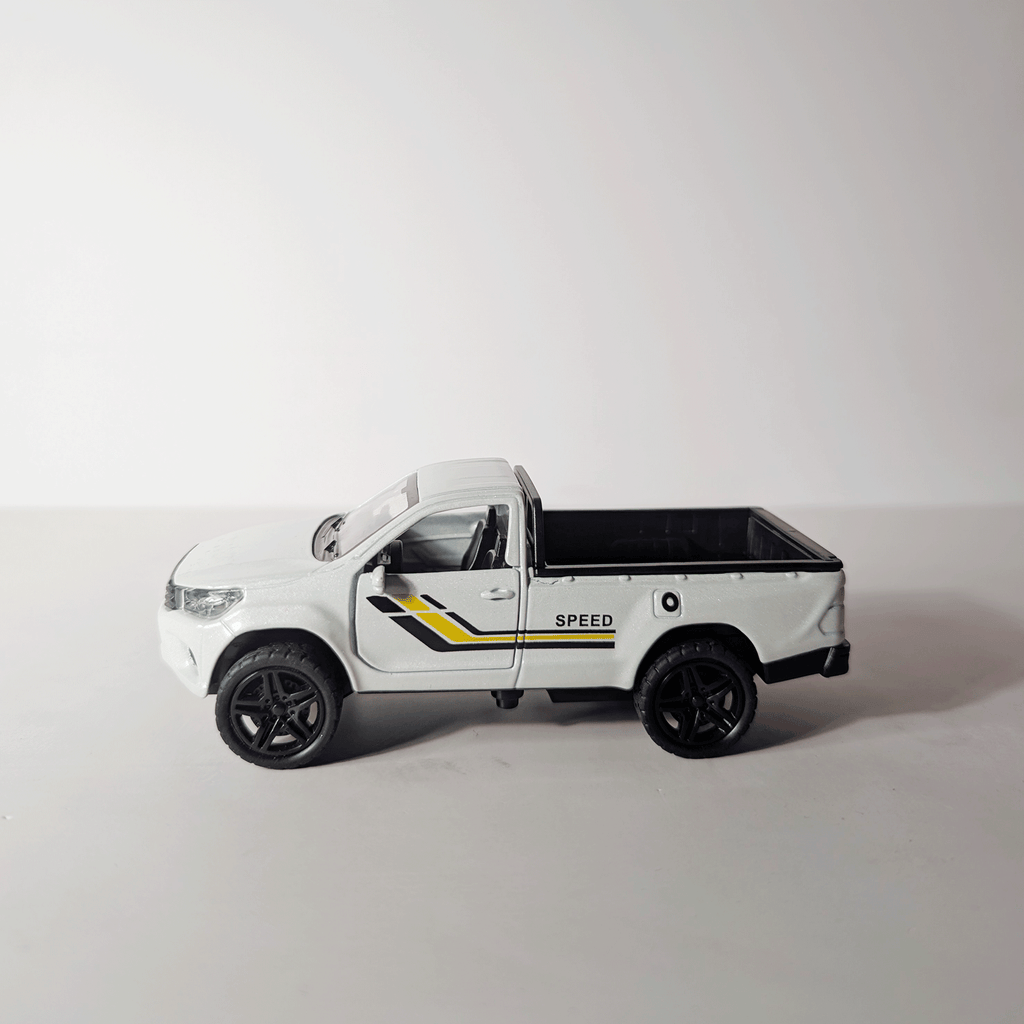1:36 Hilux Old Model White